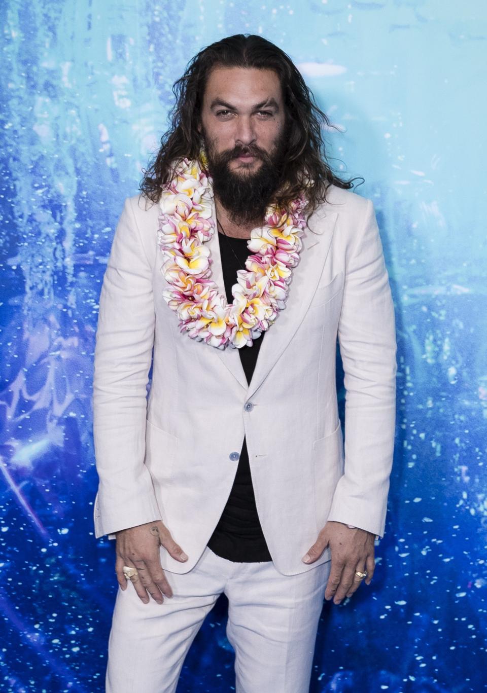 Momoa wearing a lei in Sydney at an Aquaman fan event in December, 2018.