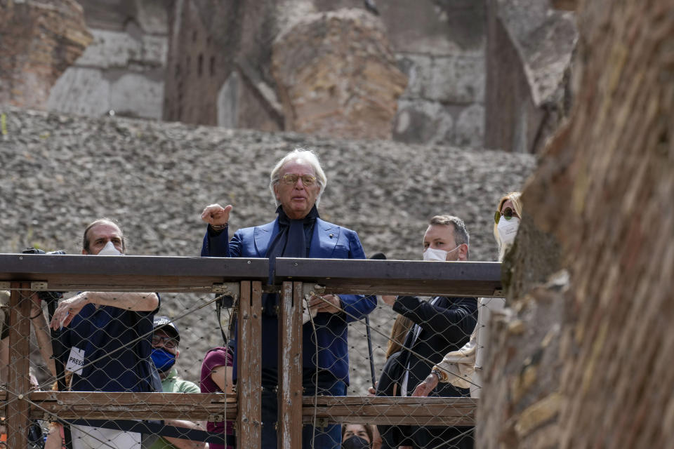 Tod's Diego Della Valle admires the lower level of the Colosseum, in Rome, Friday, June 25, 2021. Italy’s culture minister on Friday formally announced the completion of work to shore-up and restore the underground section, in the presence of the founder of Tod’s, the shoe-and-luxury-goods maker, who has footed the bill. (AP Photo/Andrew Medichini)