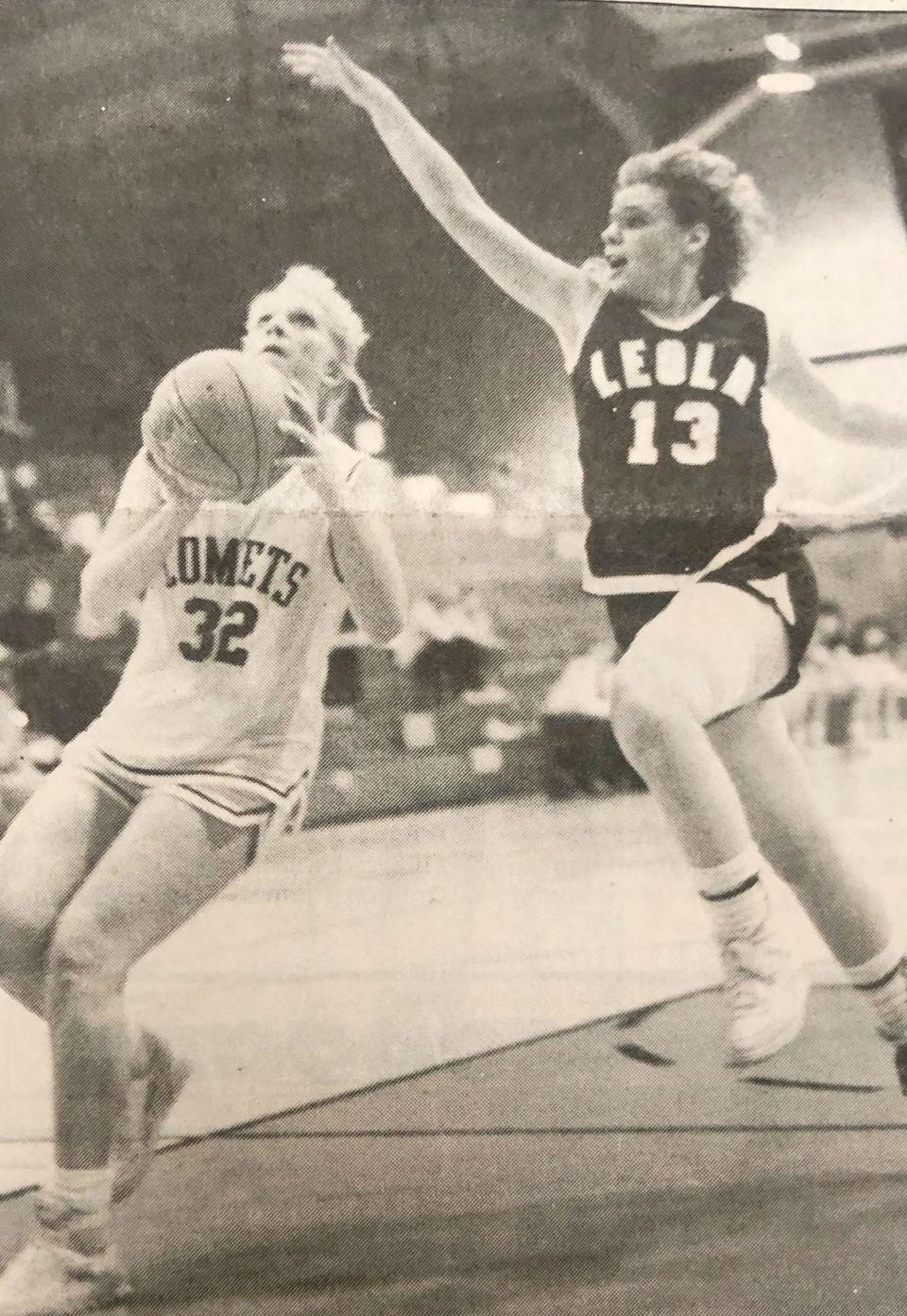 South Shore's Traci Jensen goes up for a shot against Leola's Beth Blumhardt during the 1986 Region 1B girls basketball tournament at Webster. Jensen scored 18 points to lead South Shore to a 43-32 semifinal win.