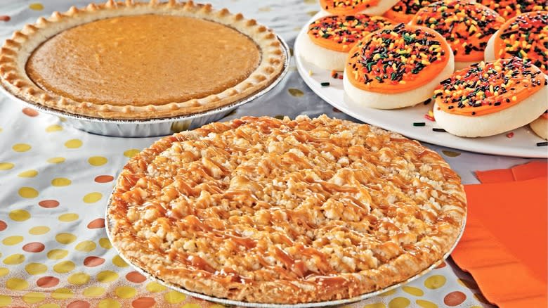 Apple and pumpkin pie on a tablecloth