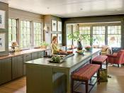 <p>A green-brown stain on the wood-paneled walls of this kitchen give the space a modern-meets-rustic vibe that's perfect for a refined <a href="https://www.southernliving.com/home/decor/natural-georgia-lake-house" rel="nofollow noopener" target="_blank" data-ylk="slk:Georgia lake house;elm:context_link;itc:0;sec:content-canvas" class="link ">Georgia lake house</a>. </p>