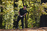 Bryson DeChambeau watches his shot out of the rough on the 11th hole during the first round of the Masters golf tournament Thursday, Nov. 12, 2020, in Augusta, Ga. (AP Photo/Chris Carlson)