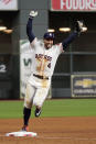 Houston Astros' George Springer celebrates after their win in Game 6 of baseball's American League Championship Series against the New York Yankees Saturday, Oct. 19, 2019, in Houston. The Astros won 6-4 to win the series 4-2. (AP Photo/Eric Gay)