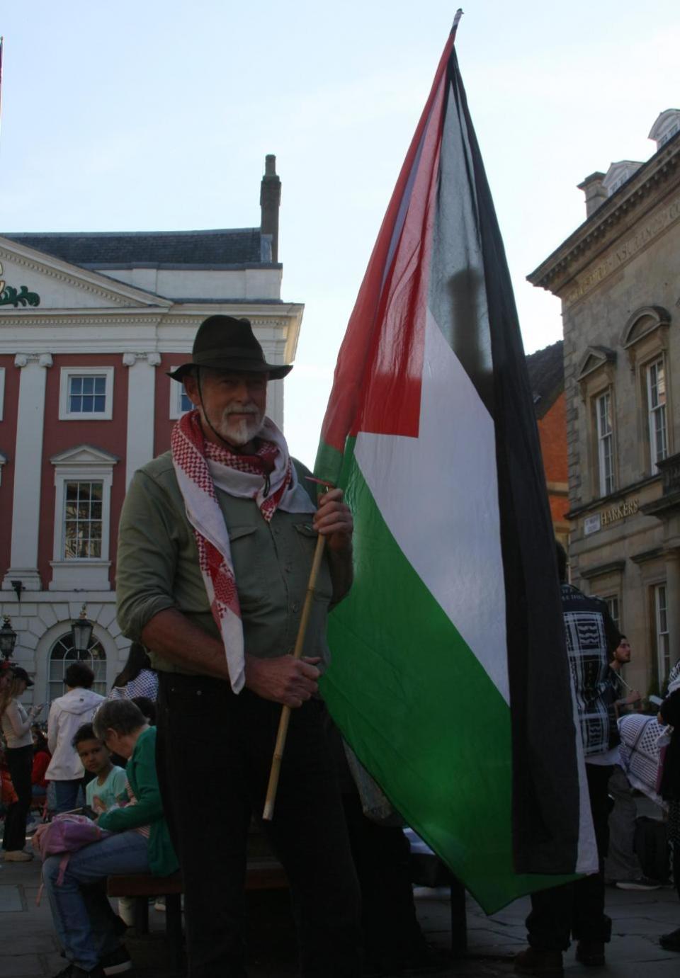 York Press: Mark Kesteven holding a Palestine flag at the protest in York