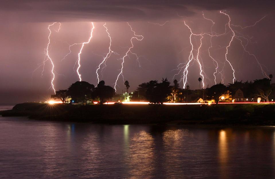 A rare lightning storm crackles over Mitchell's Cove in Santa Cruz, California around 3 a.m. Sunday morning August 16, 2020.