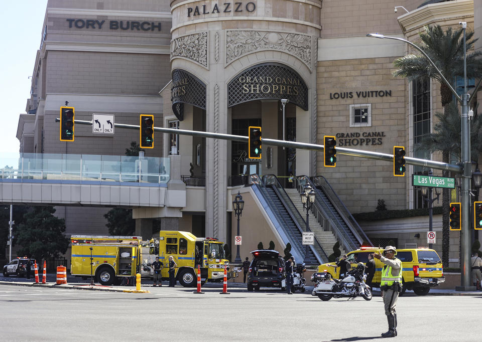 Police work at the scene where multiple people were stabbed in front of a Strip casino in Las Vegas, Thursday, Oct. 6, 2022. (Rachel Aston/Las Vegas Review-Journal via AP)