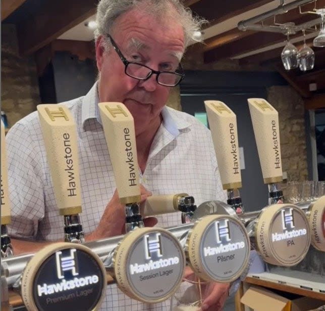 Jeremy Clarkson pouring a pint