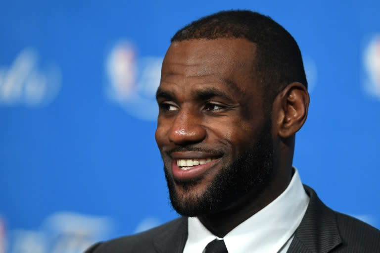 LeBron James of the Cleveland Cavaliers speaks to the press after defeating the Golden State Warriors in Game 6 of the 2016 NBA Finals, at Quicken Loans Arena in Cleveland, Ohio, on June 16