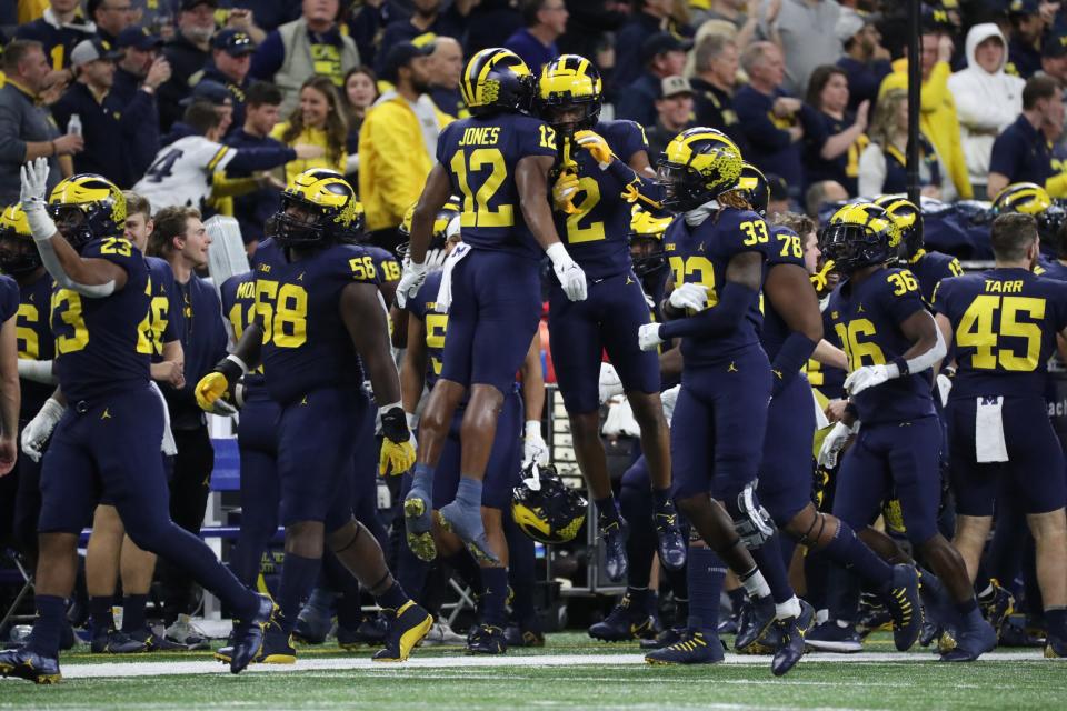 Michigan Wolverines defensive back Will Johnson (2) celebrates his interception against the Purdue Boilermakers during the second half of the Big Ten championship game at Lucas Oil Stadium in Indianapolis, Saturday, Dec. 3, 2022.