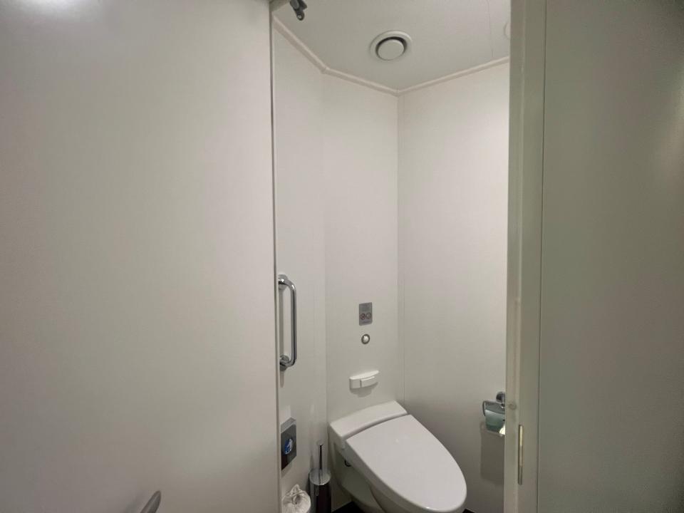 Norwegian Getaway studio bathroom stall with closed toilet