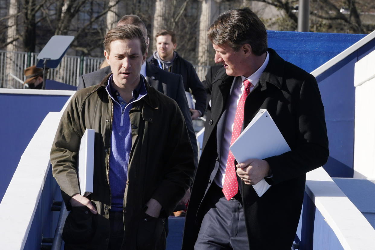 Virginia Gov.-elect, Glenn Youngkin, right, talks with Devin O'Malley