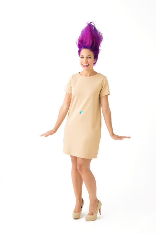 <p>It's all about the hair — and belly button jewel — when it comes to this iconic toy ensemble. </p><p>Get the <strong><a href="https://studiodiy.com/diy-90s-toys-costumes//" rel="nofollow noopener" target="_blank" data-ylk="slk:Troll Doll Costume tutorial;elm:context_link;itc:0;sec:content-canvas" class="link ">Troll Doll Costume tutorial</a></strong> at Studio DIY. </p>