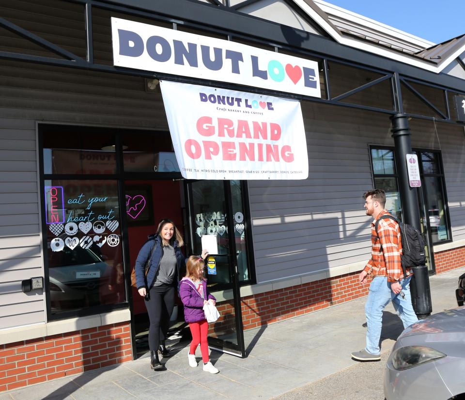 Customers line up for donuts at the grand opening of Donut Love’s third location in Newmarket on Feb. 27, 2024. The new shop offers a variety of flavors and toppings to satisfy any sweet tooth.