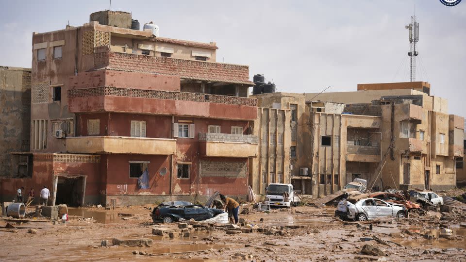 Cars and rubble on a street in Derna, Libya, on Monday, Sept. 11, 2023. - Libyan government/AP