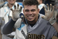 Milwaukee Brewers' Willy Adames poses for a photo after hitting a two-run home run against the Atlanta Braves during the fourth inning of a baseball game Friday, July 30, 2021, in Atlanta. (AP Photo/Hakim Wright Sr.)