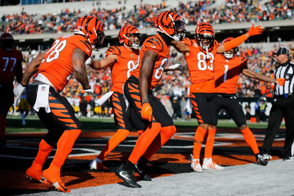 Cincinnati Bengals wide receiver Tee Higgins (85) celebrates his own touchdown reception in the second quarter of the NFL Week 12 game between the Cincinnati Bengals and the Pittsburgh Steelers at Paul Brown Stadium in downtown Cincinnati on Sunday, Nov. 28, 2021.