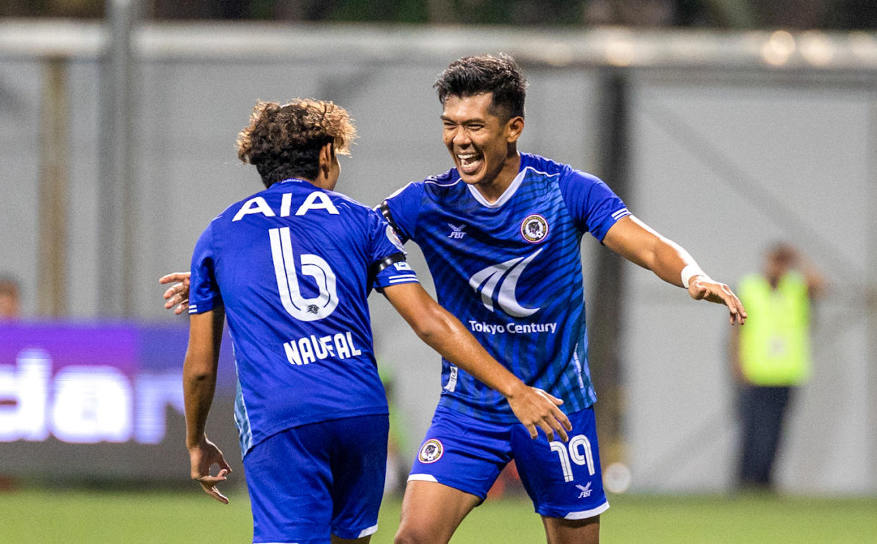 Former Singapore national forward Khairul Amri (right) celebrates scoring the winning goal for Tanjong Pagar United against Hougang United in their Singapore Premier League clash. (PHOTO: SPL)