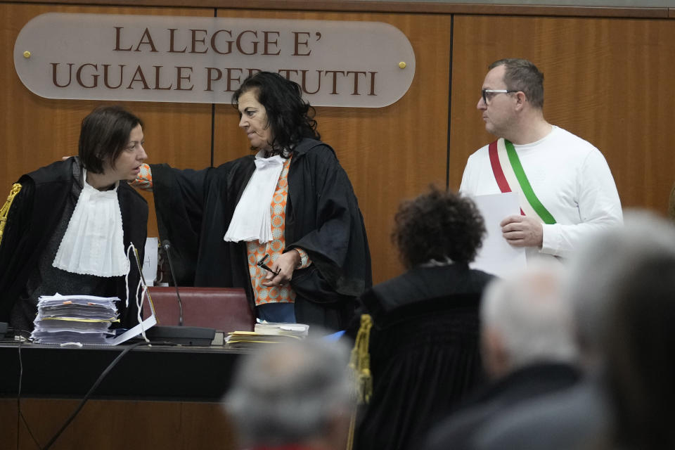 President of the court Paola Roja arrives for the start of the trial for the killing of Cambridge University researcher Giulio Regeni, at the Rome's court, Tuesday, Feb. 20, 2024. Four high-level Egyptian security officials are going on trial in absentia in a Rome court, accused in the 2016 abduction, torture and slaying of an Italian doctoral student in Cairo. (AP Photo/Andrew Medichini)