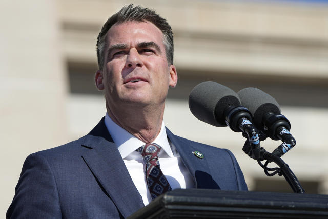 FILE - Oklahoma Gov. Kevin Stitt speaks during inauguration ceremonies Jan. 9, 2023, in Oklahoma City. The Oklahoma Legislature on Thursday, May 25, 2023, overrode Gov. Stitt’s veto of a bill that would allow students to wear Native American regalia during high school and college graduations. (AP Photo/Sue Ogrocki, File)