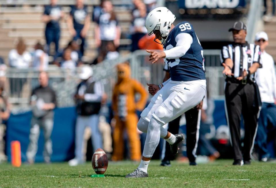 Penn State’s Gabriel Nwosu kicks during the Blue-White game on Saturday, April 23, 2022.