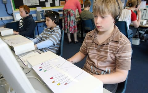 Children learn the skill of touch typing in a holiday class at Orleans Park School in Twickenham - Credit: Ian Jones