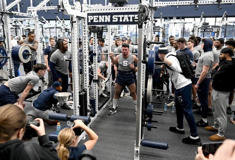 Teammates cheer for Penn State linebacker Dominic DeLuca as he lifts during a winter workout session on Thursday, Feb. 29, 2024. Abby Drey/adrey@centredaily.com