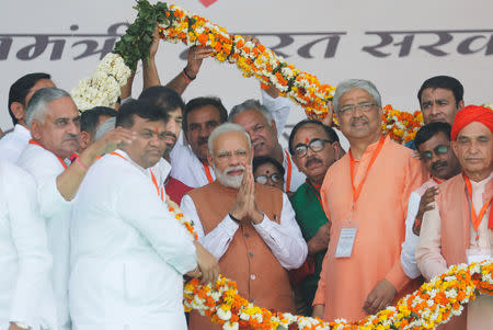 India's Prime Minister Narendra Modi greets his party supporters during an election campaign rally in Meerut in the northern Indian state of Uttar Pradesh, India, March 28, 2019. REUTERS/Adnan Abidi