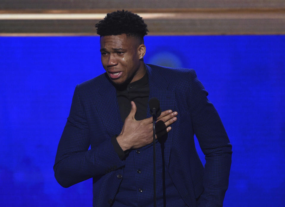 NBA player Giannis Antetokounmpo, of the Milwaukee Bucks, reacts as he accepts the most valuable player award at the NBA Awards on Monday, June 24, 2019, at the Barker Hangar in Santa Monica, Calif. (Photo by Richard Shotwell/Invision/AP)