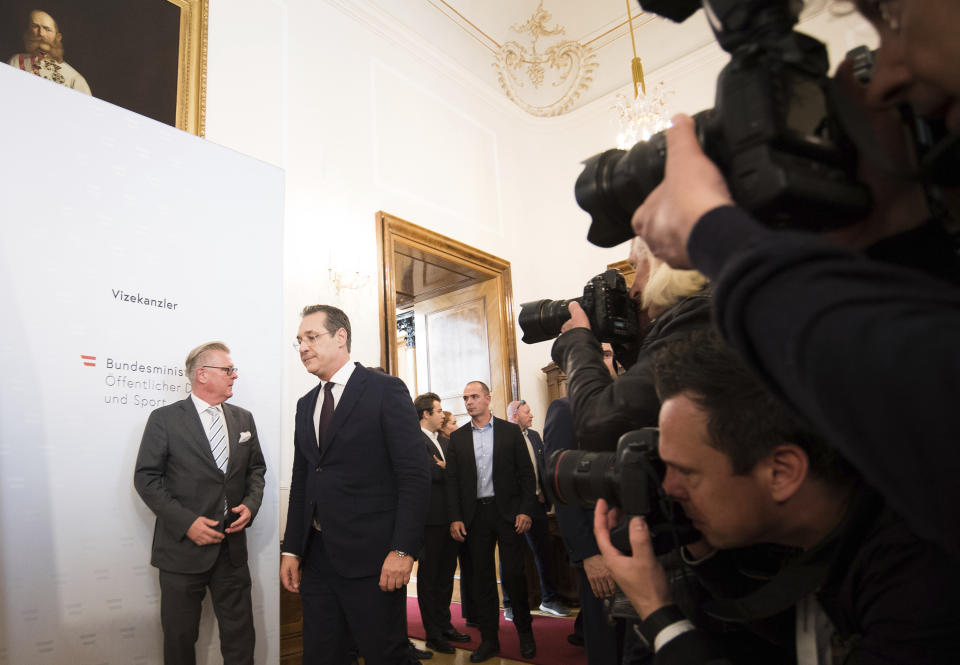 FILE - In this Saturday, May 18, 2019 file photo, Austrian Vice Chancellor Heinz-Christian Strache (Austrian Freedom Party), second left, arrives for a press conference at the sport ministry in Vienna, Austria. The European Parliament elections have never been so hotly anticipated or contested, with many predicting that this year’s ballot will mark a coming-of-age moment for the euroskeptic far-right movement. The elections start Thursday May 23, 2019 and run through Sunday May 26 and are taking place in all of the European Union’s 28 nations. (AP Photo/Michael Gruber, File)