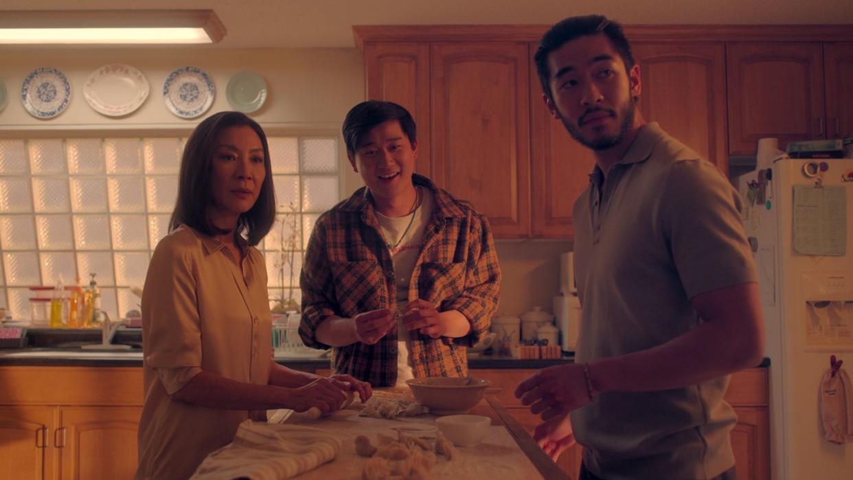 the brothers sun l to r michelle yeoh as mama sun, sam song li as bruce sun, justin chien as charles sun in episode 108 of the brothers sun cr courtesy of netflix 2023