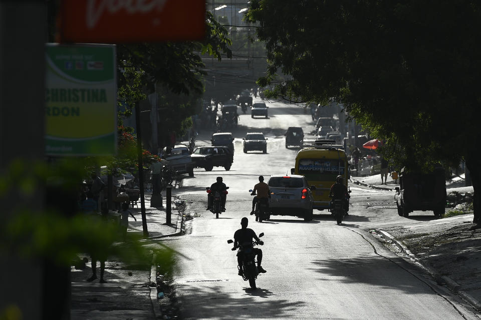 People drive on a main road in Port-au-Prince, Haiti, Saturday, July 10, 2021, three days after President Jovenel Moise was assassinated in his home. (AP Photo / Matias Delacroix)