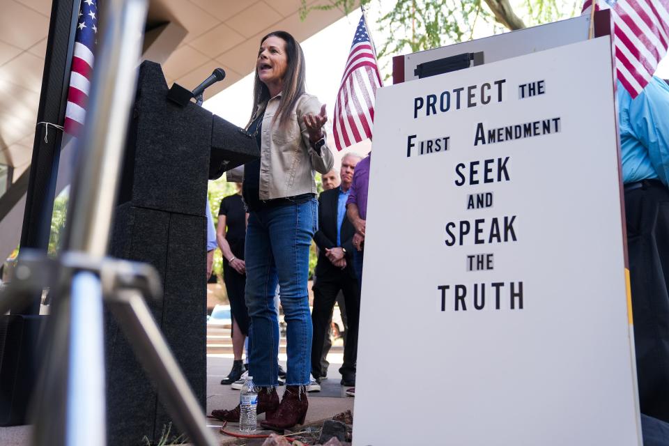 Marlene Galan-Woods, a former journalist, speaks to the media during a press conference at the Arizona State University Downtown Phoenix Campus on Wednesday, Oct. 19, 2022, in Phoenix.