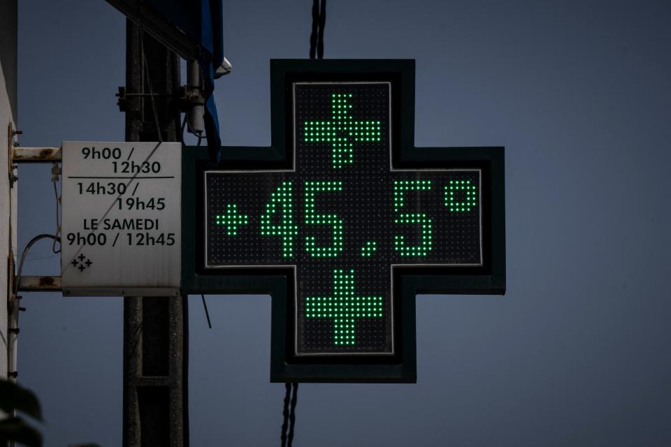 This photograph taken on June 16, 2022, shows a sign of a pharmacy displaying the 45,5  degree celsius temperature in Toulouse, southwestern France. - France is set to face the earliest heat wave ever recorded by weather service Meteofrance places 25 departments under orange level heat wave alert and 12 under the red level, the highest level of alert. (Photo by Lionel BONAVENTURE / AFP) (Photo by LIONEL BONAVENTURE/AFP via Getty Images)