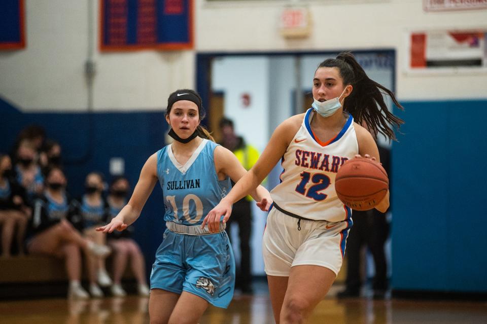 Seward's Shannon Sgombick dribbles upcourt during girls Section 9 basketball at Seward Institute in Florida on Saturday, February 26, 2022.