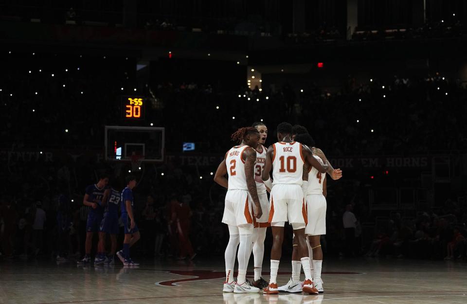Texas players huddle during a timeout in Thursday night's 72-67 win over No. 7 Creighton, Texas' second win over a top-10 team in a 6-0 start. “I don’t think we’ve proven anything," head coach Chris Beard said of the No. 2-ranked Longhorns. "We’re just a team that’s trying to get better."