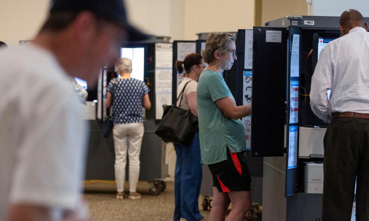 <span>Voters cast their ballots for the Georgia primary in Atlanta, on 21 May 2024.</span><span>Photograph: Alyssa Pointer/Reuters</span>