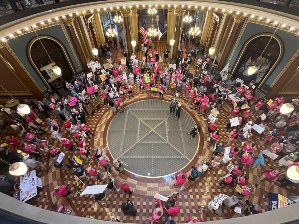Protesters gather at the Iowa Capitol rotunda to voice opposition to the new ban on abortion after roughly six weeks of pregnancy introduced by Republican lawmakers in a special session in Des Moines, Iowa on Tuesday, July 11, 2023. (AP Photo/Hannah Fingerhut)