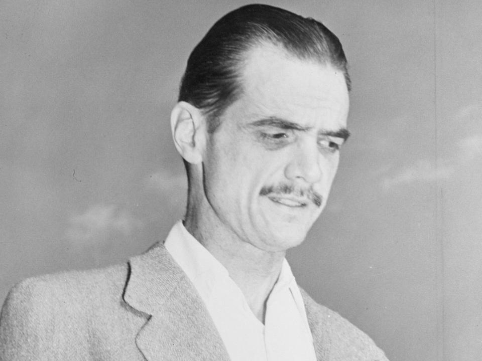 Howard Hughes smiled wanly for the camera in Kansas City in 1946.