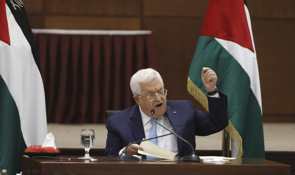 Palestinian President Mahmoud Abbas heads a leadership meeting at his headquarters, in the West Bank city of Ramallah, Tuesday, May 19, 2020. (Alaa Badarneh/Pool Photo via AP)