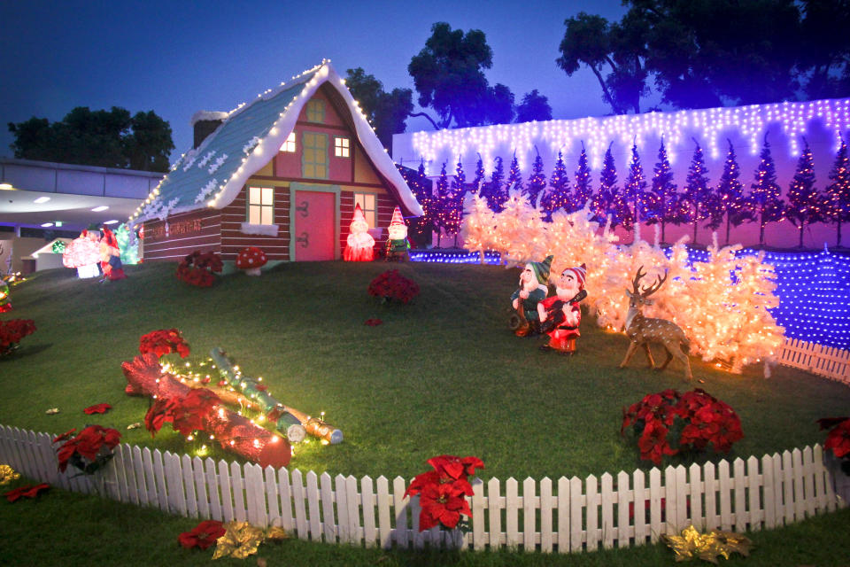 The colorful house of gnomes display inside the Christmas Village in the Tropics at Singapore Flyer.