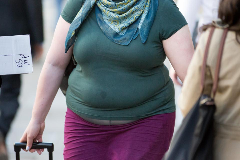 <p>About 63 per cent of adults in England are overweight or obese</p> (PA)