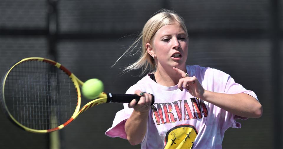Wylie's Carly Bontke returns a shot during practice Thursday at the Wylie tennis courts.