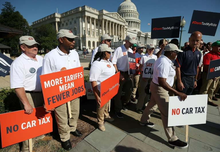 Auto workers rally on Capitol Hill in Washington, DC, against U.S. President Donald Trump's proposed tariffs on auto imports and the impact on auto makers and their surrounding communities