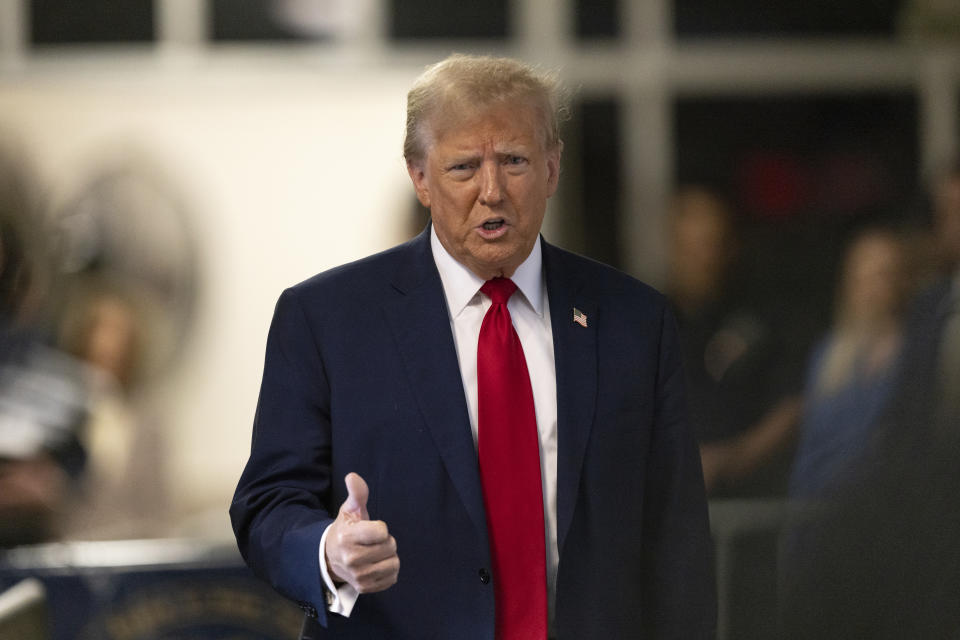 Former President Donald Trump speaks to members of the media at Manhattan criminal court in New York, Thursday, April 25, 2024. (Jeenah Moon/Pool Photo via AP)