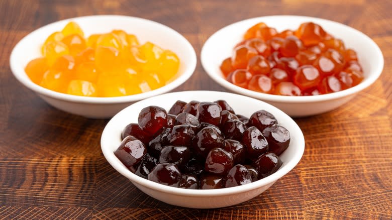 Bowls of different colored tapioca pearls