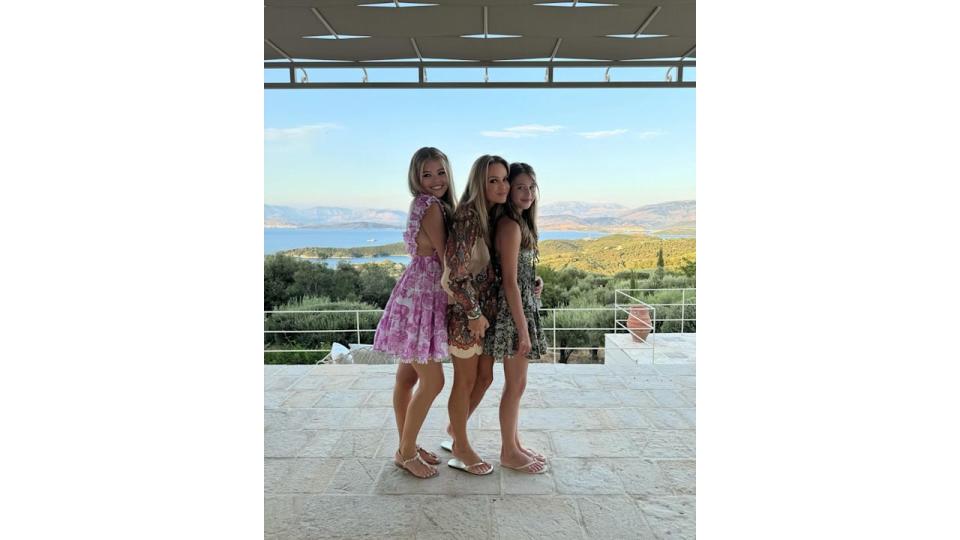 amanda holden posing with two daughters