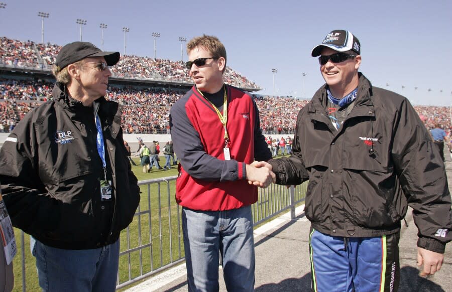 Roger Staubach, Troy Aikman and Tony Raines talk before the