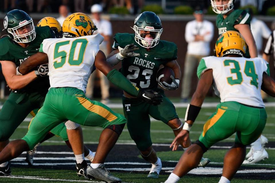 Trinity 1,000-yard rusher Clint Sansbury looked for an opening when the Shamrocks beat Bryan Station 36-3 early this season in Louisville, a game in which the Defenders committed five turnovers. Timothy D. Easley/Special to the/USA TODAY NETWORK