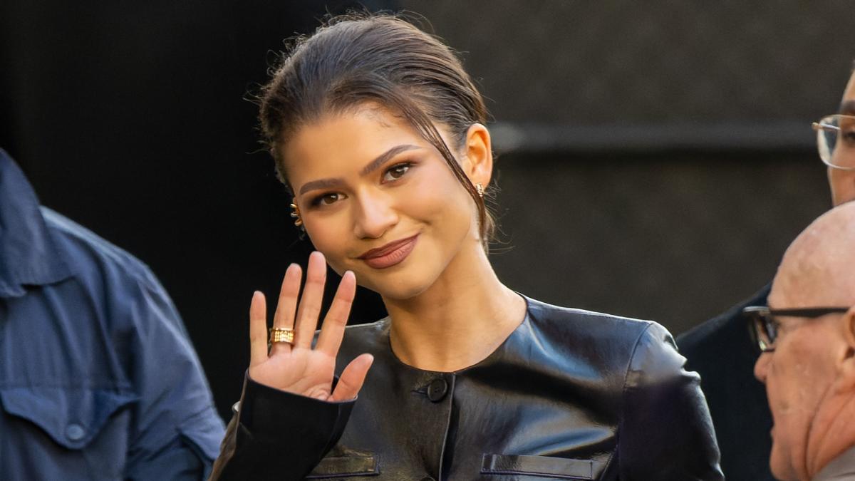 Zendaya Wore an Half-Unbuttoned Leather Top With Flares to Promote ...