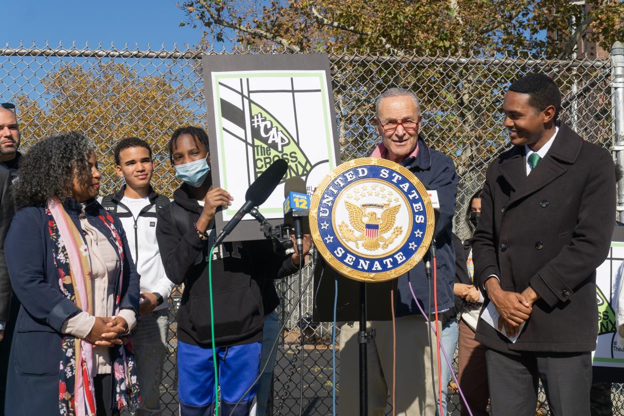 Sen. Chuck Schumer and other elected officials, including Rep. Ritchie Torres, at right, hold a press conference on plans to 